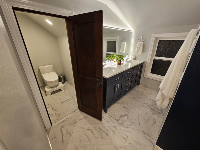 Full master suite remodel, heated tile, large tile shower with heated bench, smart lighting throughout.